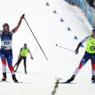 Carina Edlingerovaa její trasér Alexandr Paťava při průjezdu cílem zdravili diváky, v individuálním závodě obsadili sedmé místo